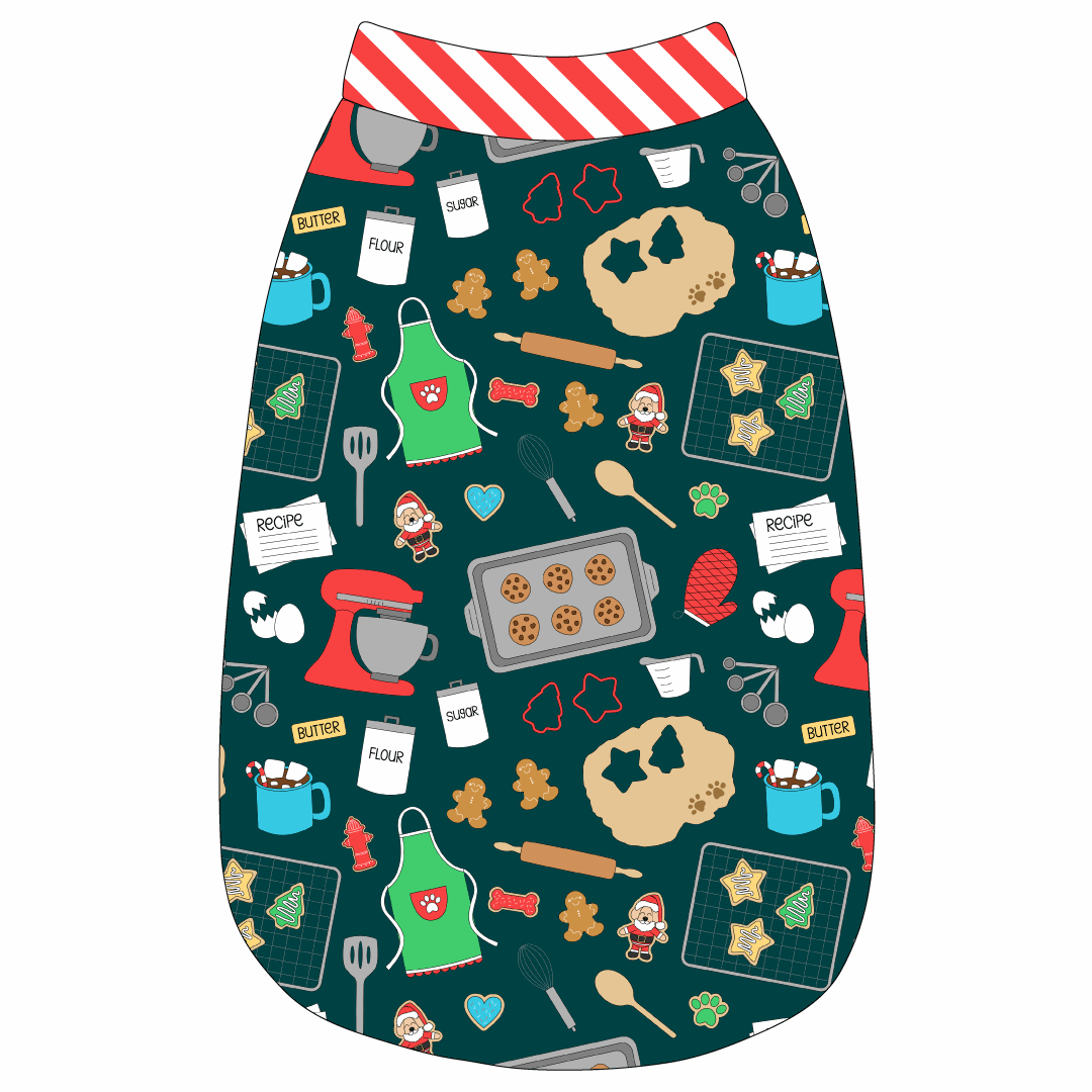 Tank in a dog friendly pattern that shows cookies baking, a light green apron, recipe cards and more on a deep emerald background. It's complete with candy cane trim on the neck, waist and shoulders.