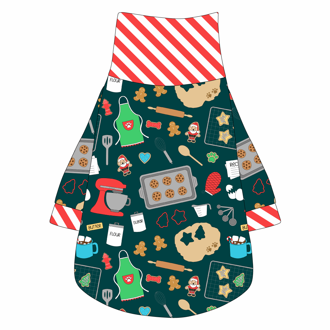 Tee shirt with turtleneck in a dog friendly pattern that shows cookies baking, a light green apron, recipe cards and more on a deep emerald background. It's complete with candy cane trim on the neck, waist and sleeves.